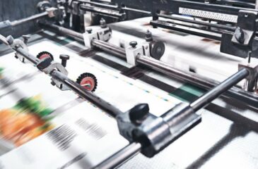 Outsourced packaging process printing and producing packaging materials on automated press